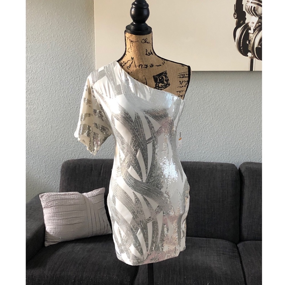 Beautiful white dress with silver glam! 🌟